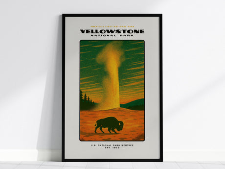 This framed poster features a vintage-style illustration of Yellowstone National Park, depicting a bison and geyser against a vibrant sunset. Ideal wall art for nature enthusiasts and collectors.