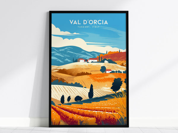 This image shows a framed poster of the Val dOrcia landscape in Tuscany, Italy. It features vibrant illustrations of rolling hills, cypress trees, and rustic farmhouses under a blue sky.