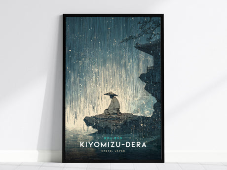 The image depicts a framed poster of a person sitting under a heavy rain, wearing a traditional hat, next to a temple structure with a textured, artistic background. The words KIYOMIZU-DERA, KYOTO, JAPAN are displayed at the bottom.