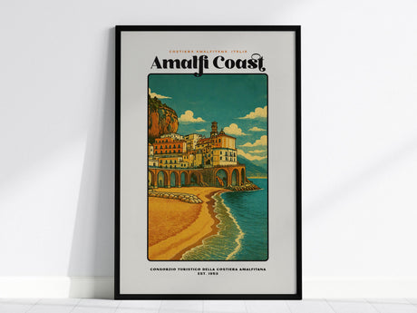 Framed poster of the Amalfi Coast with a scenic view of buildings and ocean.