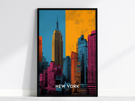 A vibrant pop art poster of the New York City skyline features the Empire State Building in bold colors with blue, orange, and pink sections. The text New York USA appears at the bottom, set in a sleek black frame.