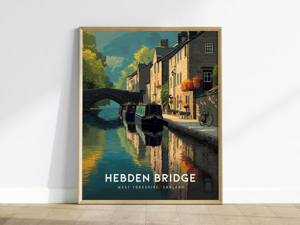 This framed poster features a picturesque canal scene in Hebden Bridge, West Yorkshire, with stone cottages, colorful canal boats, and a stone bridge. The reflections in the calm water and vibrant autumnal foliage add charm to the artwork.