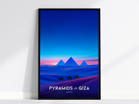 A framed poster features the Pyramids of Giza depicted in a bold, contemporary design. Camels are silhouetted against a vibrant dusk sky, with the iconic pyramids rising from the desert, creating a striking visual.