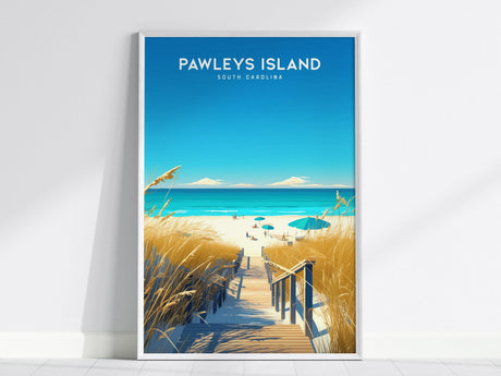 A framed poster depicts Pawleys Island, South Carolina, featuring a boardwalk leading through tall sea oats to a sunny beach with blue umbrellas. The bright blue sky and ocean create a serene coastal scene.