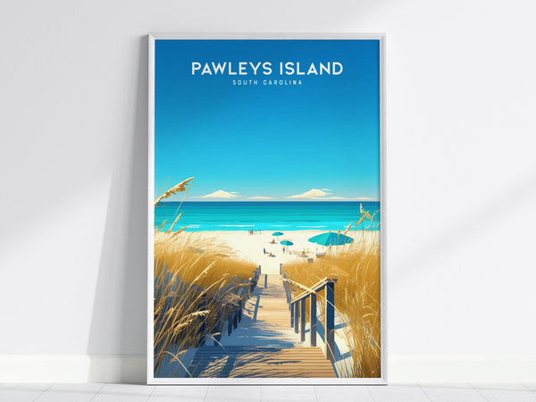 A framed poster depicts Pawleys Island, South Carolina, featuring a boardwalk leading through tall sea oats to a sunny beach with blue umbrellas. The bright blue sky and ocean create a serene coastal scene.