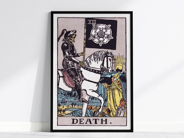 Interior view showing framed and unframed wall art depicting the transformative symbolism of the Death tarot card.