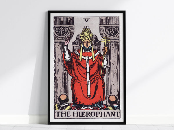 A framed poster of The Hierophant tarot card is displayed, featuring a figure in red robes and a crown, holding a staff. The card number V is at the top, with intricate column designs on either side.