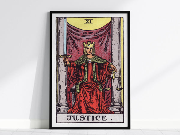 The image shows a framed Justice tarot card poster featuring the classic Rider-Waite-Smith illustration. A figure in a red robe sits between stone pillars, holding a sword and scales, embodying balance and fairness.