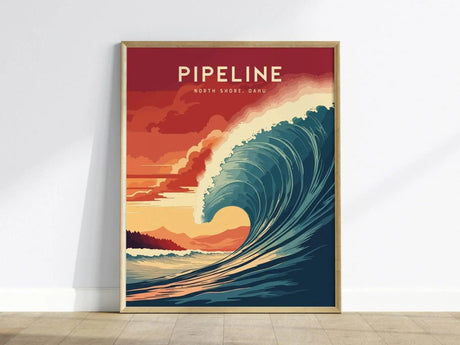 Framed poster depicting a stylized wave forming a barrel against a vibrant sunset sky in shades of red and orange. The text reads Pipeline North Shore, Oahu, showcasing iconic surf art.