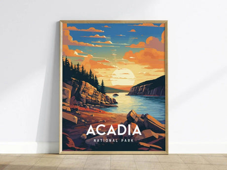 A vibrant poster of Acadia National Park features a serene coastal scene with rocky cliffs, pine trees, and the sun setting over the tranquil Atlantic waters. The artwork prominently displays the text Acadia National Park at the bottom.