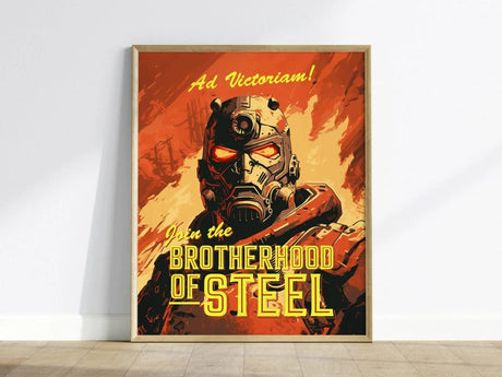 Framed poster featuring a soldier in power armor with glowing red eyes, set against an orange background. Text reads Ad Victoriam! Join the Brotherhood of Steel.