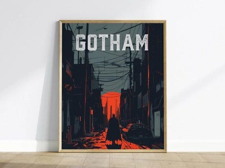 A framed poster depicts a shadowy figure in a long cape walking down a dimly lit urban street with power lines overhead. The background features a red and gray sky with the word GOTHAM prominently displayed at the top.