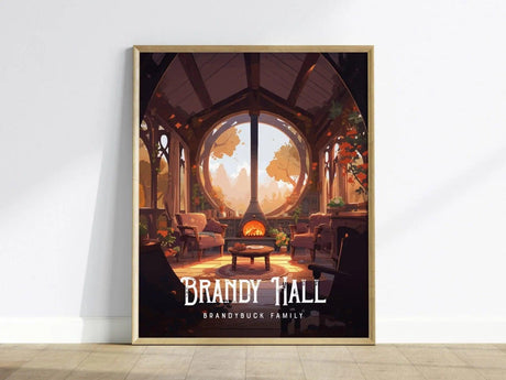 Framed poster of Brandy Hall showing a cozy Hobbit living room with a glowing fireplace and round window. The room is filled with warm tones and rustic furnishings.