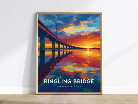 A colorful poster depicting the John Ringling Bridge at sunset, with vibrant reflections in the water and a dramatic sky. The text reads Ringling Bridge, Sarasota, Florida at the bottom.