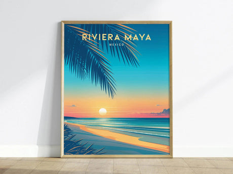 A vibrant travel poster featuring the words RIVIERA MAYA and MEXICO at the top. The artwork depicts a serene beach scene at sunset, with gentle waves, a colorful sky transitioning from orange to blue, and palm leaves framing the image.