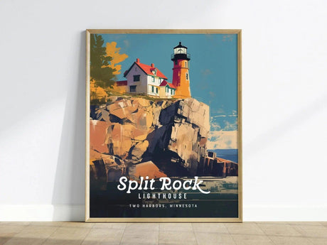 A framed poster of Split Rock Lighthouse, featuring a vibrant illustration of the lighthouse perched on rocky cliffs under a blue sky, with the text Two Harbors, Minnesota.