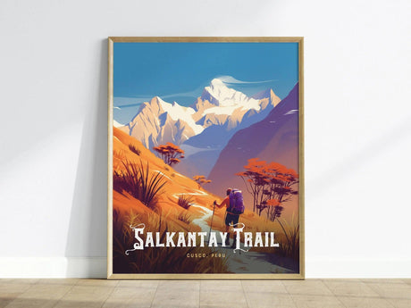 A framed poster depicts a hiker on the Salkantay Trail surrounded by vibrant orange hills and snow-capped mountains under a blue sky. The text reads Salkantay Trail Cusco, Peru.