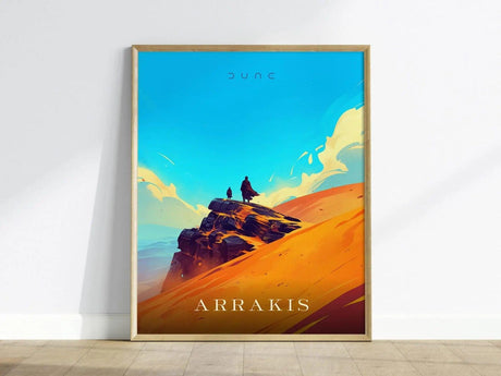 Framed poster of a desert landscape with two figures on a rock, titled 'Arrakis'.