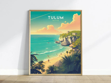 A beautifully framed poster of Tulum, Mexico, showcasing vibrant turquoise waters and a sandy beach. Lush greenery and dramatic cliffs frame the scene, capturing the serene beauty of this coastal destination at sunset.