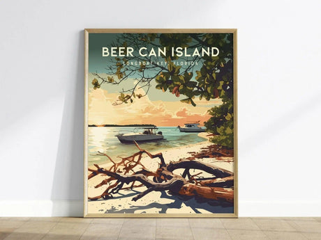 A framed poster of Beer Can Island, Longboat Key, Florida, showcasing a serene beach scene with driftwood on the sand, boats anchored in turquoise waters, and overhanging branches against a sunset sky.