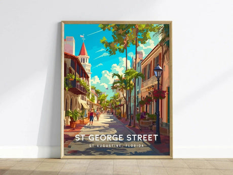 A vibrant vintage-style poster depicting St. George Street in St. Augustine, Florida. The artwork showcases charming Spanish colonial architecture, lush greenery, and a sunny blue sky, inviting viewers to explore this historic.
