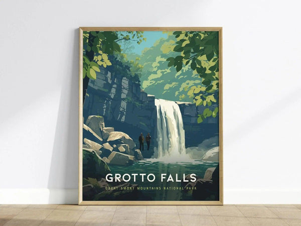 Framed artwork depicting a serene waterfall in a lush forest setting, with two small figures standing by the water. The poster reads Grotto Falls, Great Smoky Mountains National Park.