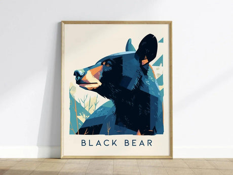 A modern vector-style poster of a black bear with abstract forest elements in the background, framed in light wood, displayed against a plain wall.