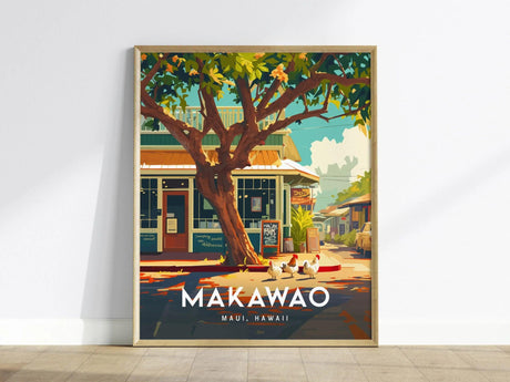A framed poster depicting a charming Makawao street with a large tree, storefront, chickens, and vibrant foliage, emphasizing the quaint, artistic atmosphere of Maui, Hawaii.