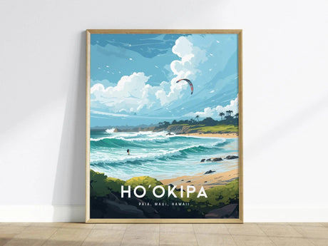 A framed poster depicting Hookipa Beach in Maui, featuring vibrant waves, a clear sky with clouds, and a distant kitesurfer. The artwork includes the text HOOKIPA, PAIA, MAUI, HAWAII.