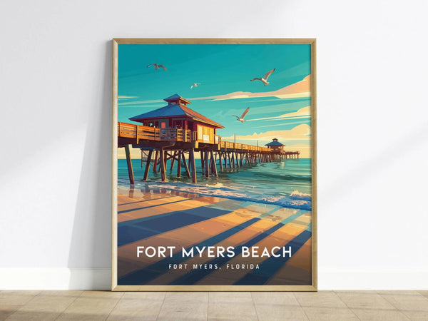 A framed poster of Fort Myers Beach depicts a vibrant pier extending over calm waters, with seagulls flying above. The text reads Fort Myers Beach, Fort Myers, Florida.