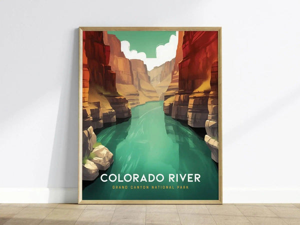 Framed poster depicting the Colorado River flowing through the Grand Canyon with vibrant red and orange canyon walls and a clear turquoise river under a bright sky.