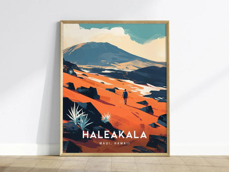 Framed artwork depicting a lone hiker on an orange-hued landscape with distant mountains under a blue sky, titled Haleakala Maui, Hawaii.