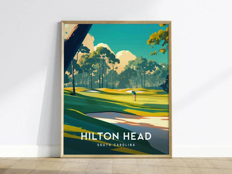 Framed poster depicting a golf course scene with lush greenery, trees, and a golfer. The text Hilton Head South Carolina is displayed at the bottom.