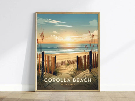 A beautifully framed poster of Corolla Beach featuring soft golden sands, gentle waves, and a vibrant sunset. The scene is bordered by tall grasses and a wooden fence, evoking a serene coastal atmosphere.