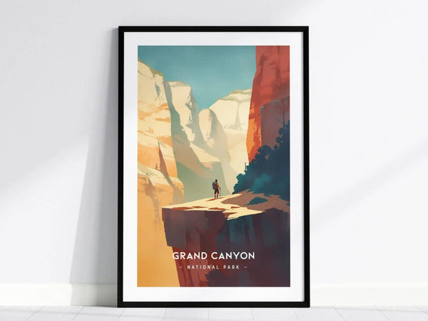Framed minimalist artwork of the Grand Canyon, featuring a hiker on a cliff, vibrant red and orange rock formations, and a clear blue sky. Text reads Grand Canyon National Park.
