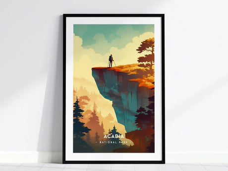 Framed minimalist poster of Acadia National Park shows a solitary figure standing on a cliff, surrounded by colorful trees and a vibrant sky.
