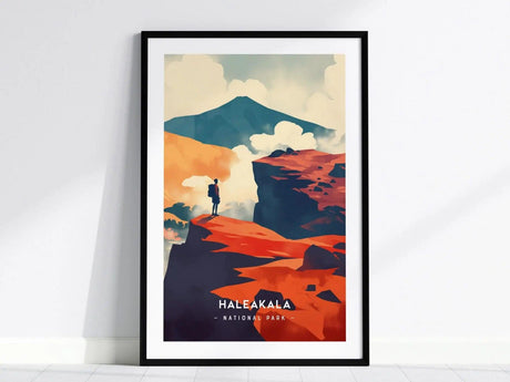 A framed poster showcases a minimalist illustration of Haleakalā National Park, featuring a figure standing on a rocky landscape with vibrant orange.