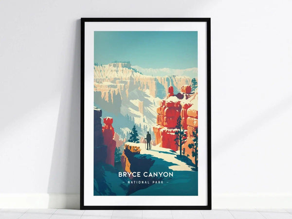 Framed minimalist art print of Bryce Canyon National Park features colorful hoodoos and a lone figure on a snowy path under a clear blue sky.