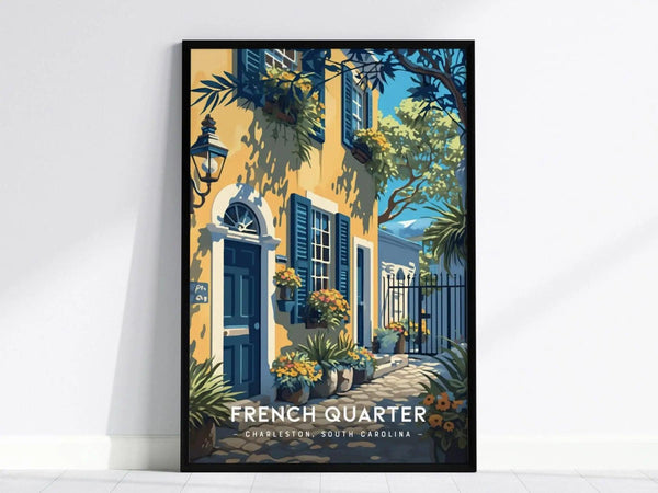 A framed poster depicting a sunny street in Charlestons French Quarter, featuring a yellow building with blue shutters, vibrant plants, and a wrought iron gate.