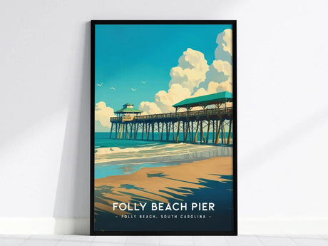 This framed poster depicts Folly Beach Pier extending into the ocean, under a vibrant blue sky with fluffy clouds and seagulls. The pier is reflected in the gentle waves.