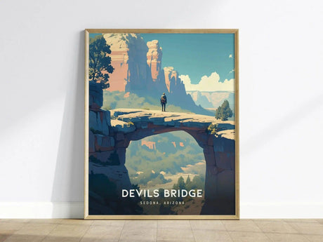 Framed poster of Devils Bridge in Sedona, Arizona, featuring a lone hiker standing on a natural sandstone arch against a backdrop of vibrant desert cliffs and blue sky.