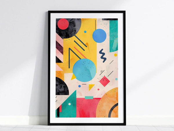 Framed abstract poster featuring bold geometric shapes and vibrant colors, including circles, squares, and zigzags, against a multicolored backdrop. The design exudes a 1990s retro aesthetic.