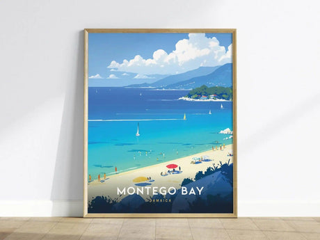 A framed poster of Montego Bay, Jamaica, features a vibrant beach scene with turquoise waters, sailboats, and lush hills under a bright sky.