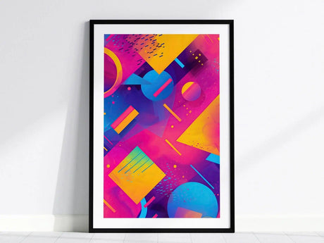 A framed poster showcasing vibrant geometric patterns in neon pinks, purples, blues, and yellows, illustrating a dynamic 80s synthwave aesthetic. The artwork is set against a plain white wall.
