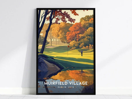 Framed artwork of a vibrant golf course scene at Muirfield Village, Dublin, Ohio, featuring colorful autumn trees, a golfer, and a reflective pond.