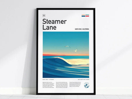 A framed poster titled Steamer Lane depicts a serene surf scene featuring gentle waves under a pastel sky with a seagull flying above. The design highlights Santa Cruz, California, showcasing the areas iconic surf culture.