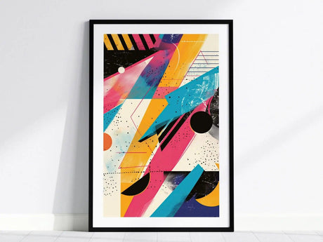 Framed poster featuring vibrant 1980s-style abstract geometric shapes, including bold stripes, circles, and dynamic color patterns in pink, blue, and yellow against a white background.