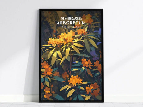 A framed poster featuring vibrant orange and yellow azaleas with lush green leaves, titled The North Carolina Arboretum, Asheville, N.C. against a dark background.