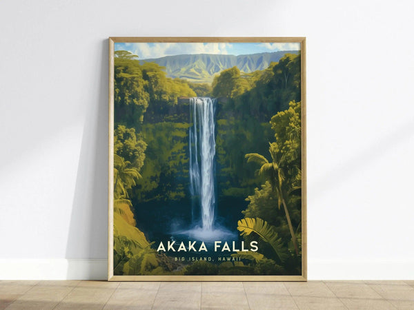 Framed poster of Akaka Falls, showcasing a waterfall cascading through lush greenery under a clear sky, leaning against a white wall on a wooden floor.