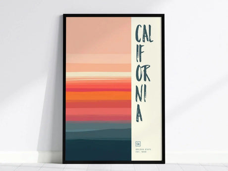 Framed poster with horizontal color gradients in pink, orange, and blue hues, featuring the word CALIFORNIA vertically on the right. The design includes text Golden State Est. 1850.
